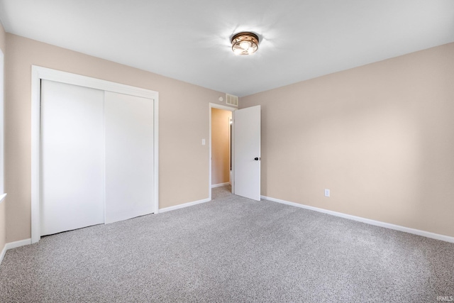 4654 Schmucker Dr, Fort Wayne, IN 46835 - unfurnished bedroom with carpet floors, baseboards, and a closet
