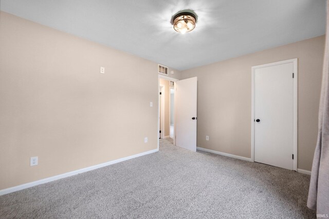 4654 Schmucker Dr, Fort Wayne, IN 46835 - unfurnished bedroom with carpet and baseboards