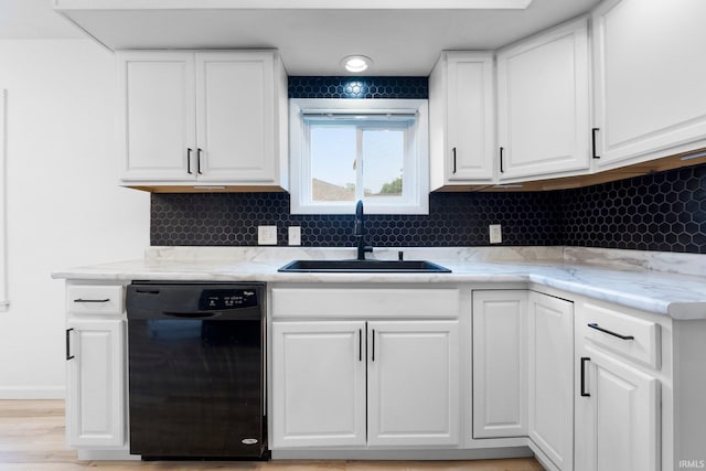 4654 Schmucker Dr, Fort Wayne, IN 46835 - kitchen with dishwasher, a sink, white cabinetry, tasteful backsplash, and light stone countertops