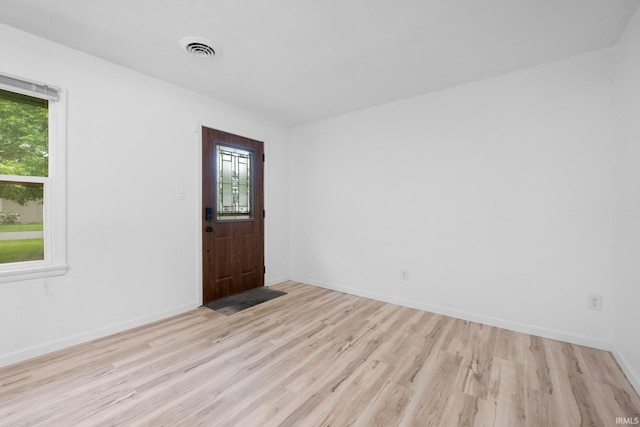 4654 Schmucker Dr, Fort Wayne, IN 46835 - entrance foyer featuring light wood finished floors and baseboards