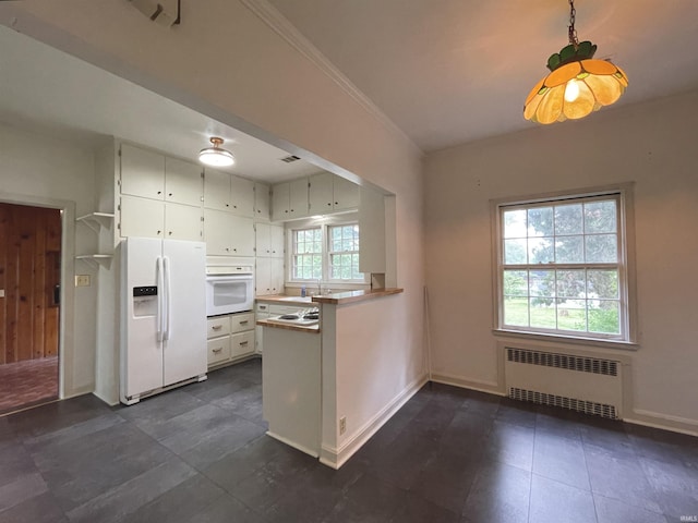 5425 Lincoln Ave, Evansville, IN 47715 - kitchen with white appliances, radiator, a peninsula, baseboards, and white cabinets