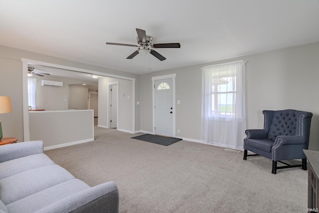 8694 W 1000 S Unit 35, Lafontaine, IN 46940 - living area featuring a ceiling fan, an AC wall unit, carpet flooring, and baseboards