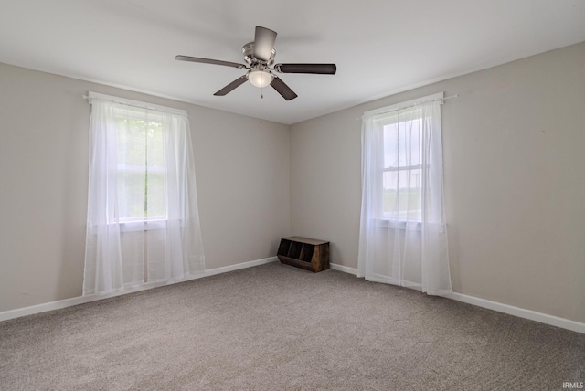 8694 W 1000 S Unit 35, Lafontaine, IN 46940 - unfurnished room with healthy amount of natural light, carpet, a ceiling fan, and baseboards