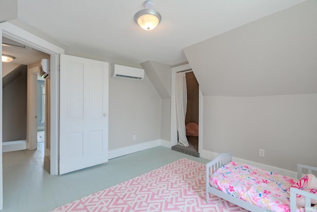8694 W 1000 S Unit 35, Lafontaine, IN 46940 - bedroom featuring an AC wall unit, baseboards, and lofted ceiling
