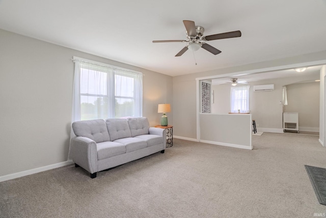 8694 W 1000 S Unit 35, Lafontaine, IN 46940 - living area featuring a wall unit AC, a ceiling fan, light colored carpet, and baseboards