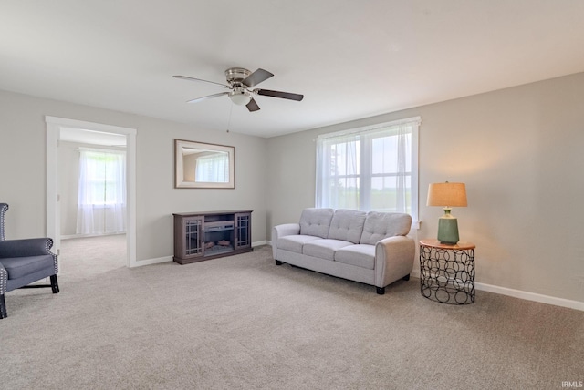 8694 W 1000 S Unit 35, Lafontaine, IN 46940 - living room with healthy amount of natural light, carpet floors, and ceiling fan