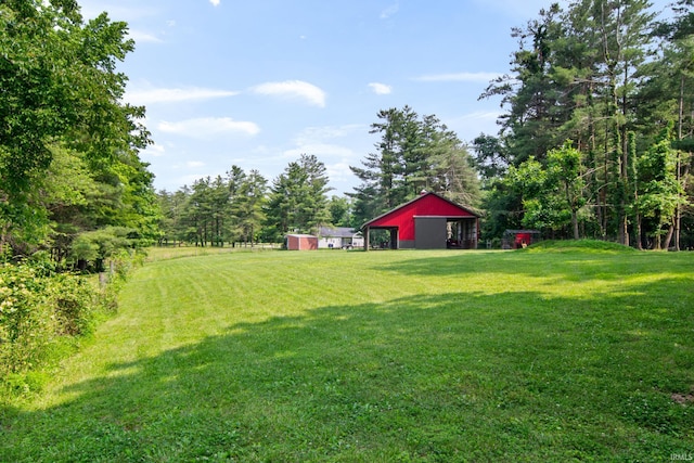 2299 Brown Chapel Rd, Boonville, IN 47601 - view of green lawn featuring an outbuilding and a garage