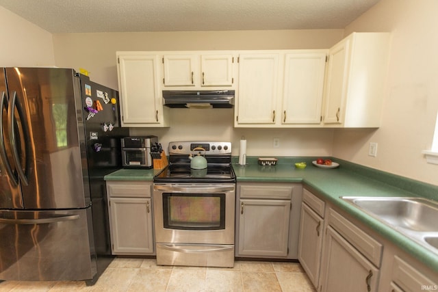 5530 W Cobblestone St, Bloomington, IN 47403 - kitchen featuring stainless steel appliances and under cabinet range hood