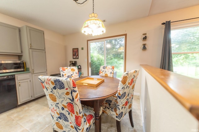 5530 W Cobblestone St, Bloomington, IN 47403 - dining space with healthy amount of natural light and light tile patterned flooring