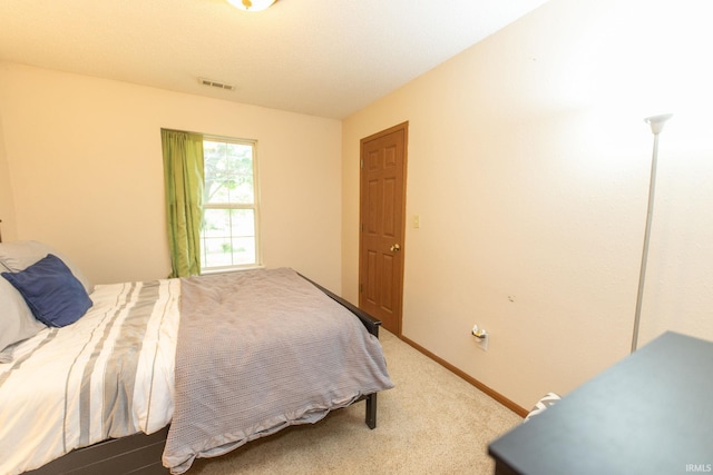 5530 W Cobblestone St, Bloomington, IN 47403 - bedroom featuring carpet flooring