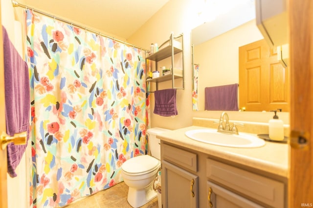 5530 W Cobblestone St, Bloomington, IN 47403 - bathroom with toilet, vanity, tile patterned flooring, and a shower with shower curtain