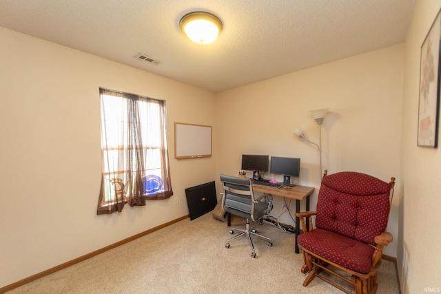 5530 W Cobblestone St, Bloomington, IN 47403 - carpeted home office with baseboards and a textured ceiling