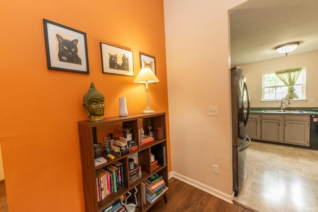 5530 W Cobblestone St, Bloomington, IN 47403 - corridor with a sink and baseboards
