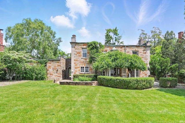 2307 Forest Park Blvd, Fort Wayne, IN 46805 - view of front of property with stone siding and a front yard