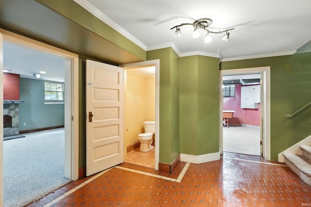 2307 Forest Park Blvd, Fort Wayne, IN 46805 - bathroom featuring a stone fireplace and crown molding
