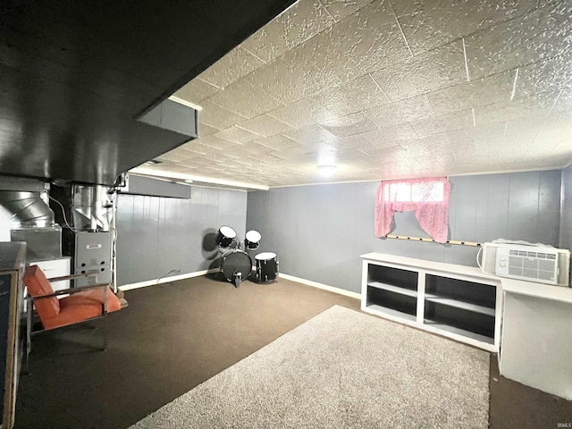 83 9th St, Logansport, IN 46947 - basement featuring carpet flooring, baseboards, and cooling unit