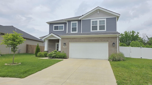 916 Cameo Dr, Evansville, IN 47711 - view of front of property featuring an attached garage, driveway, brick siding, and a gate