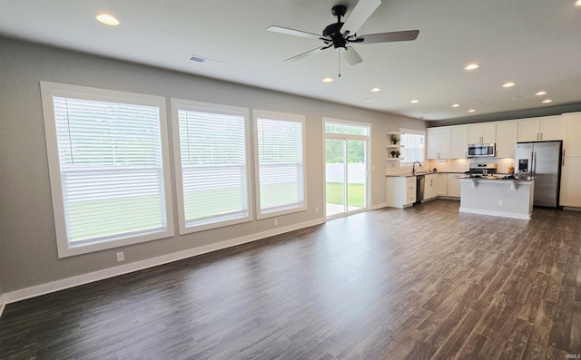 916 Cameo Dr, Evansville, IN 47711 - living room with dark wood finished floors, recessed lighting, a ceiling fan, and baseboards