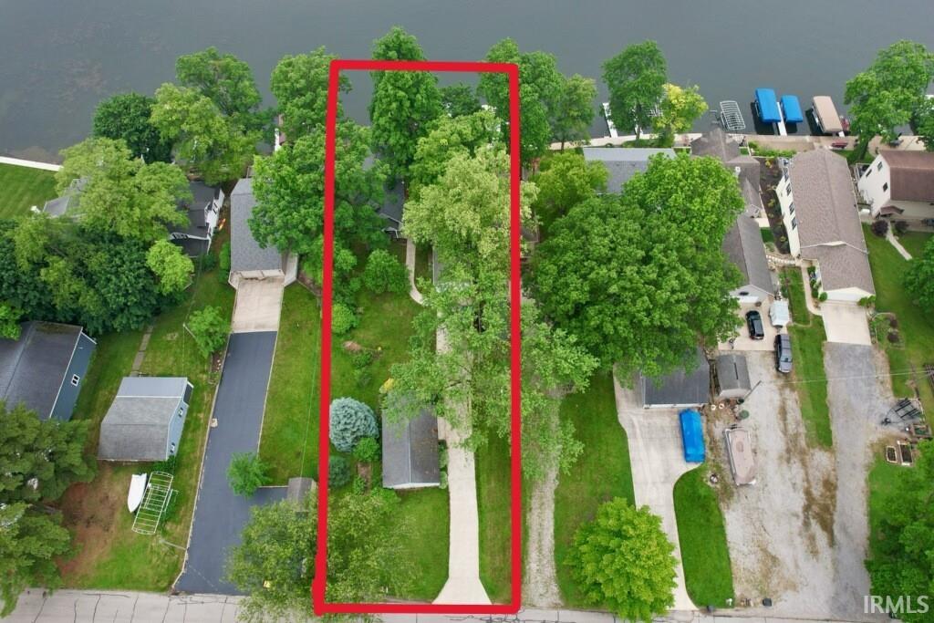 306 Spring Beach Rd, Rome City, IN 46784 - aerial perspective of suburban area