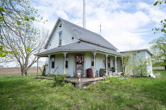 9529 N 600 E, North Manchester, IN 46962 - view of front facade with covered porch and a shingled roof