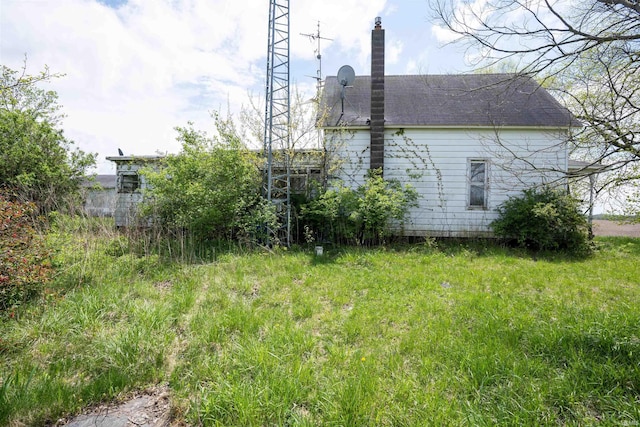 9529 N 600 E, North Manchester, IN 46962 - view of home's exterior with a chimney