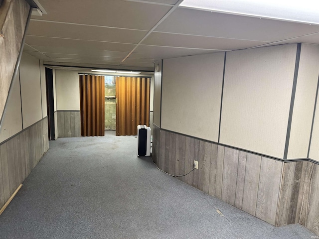 539 Goshen Ave, Elkhart, IN 46516 - finished basement with carpet flooring, wooden walls, a drop ceiling, and a wainscoted wall