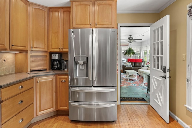 3709 Capilano Dr, West Lafayette, IN 47906 - kitchen featuring stainless steel fridge, light wood-style floors, decorative backsplash, crown molding, and ceiling fan