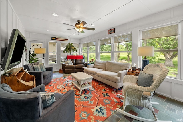 3709 Capilano Dr, West Lafayette, IN 47906 - living room featuring a ceiling fan, plenty of natural light, stone finish flooring, and recessed lighting