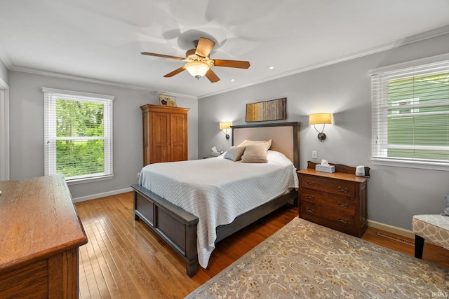 3709 Capilano Dr, West Lafayette, IN 47906 - bedroom featuring ornamental molding, hardwood / wood-style floors, baseboards, and a ceiling fan