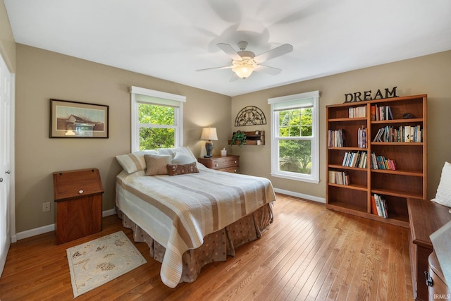 3709 Capilano Dr, West Lafayette, IN 47906 - bedroom featuring light wood-type flooring, baseboards, and ceiling fan