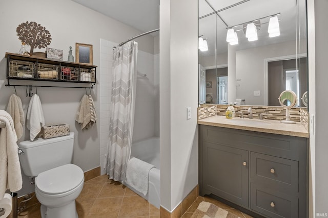 3709 Capilano Dr, West Lafayette, IN 47906 - bathroom with vanity, baseboards, shower / tub combo with curtain, tasteful backsplash, and toilet