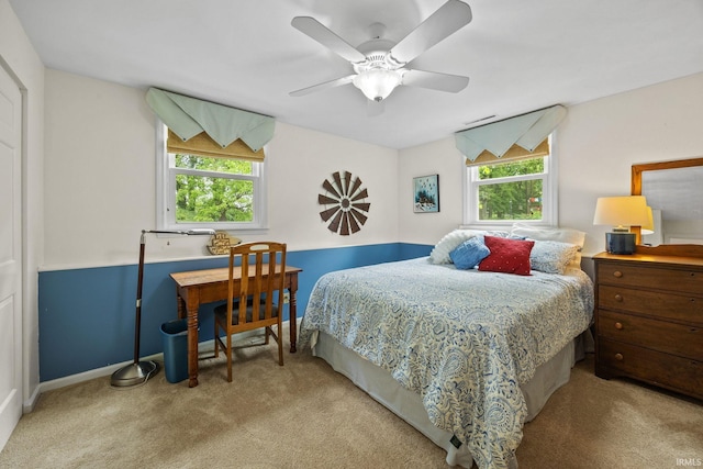 3709 Capilano Dr, West Lafayette, IN 47906 - carpeted bedroom with multiple windows, ceiling fan, and baseboards