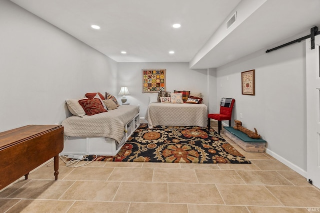 3709 Capilano Dr, West Lafayette, IN 47906 - tiled bedroom with a barn door, recessed lighting, and baseboards