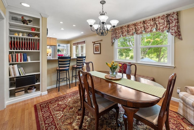 3709 Capilano Dr, West Lafayette, IN 47906 - dining area featuring a chandelier, light wood-type flooring, recessed lighting, ornamental molding, and baseboards
