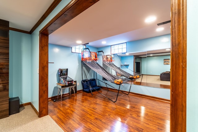 10909 Bittersweet Dells Ln, Fort Wayne, IN 46814 - playroom with baseboards, ornamental molding, recessed lighting, and wood finished floors