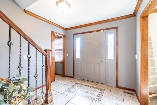 10909 Bittersweet Dells Ln, Fort Wayne, IN 46814 - entryway with baseboards, stairs, ornamental molding, and light tile patterned floors