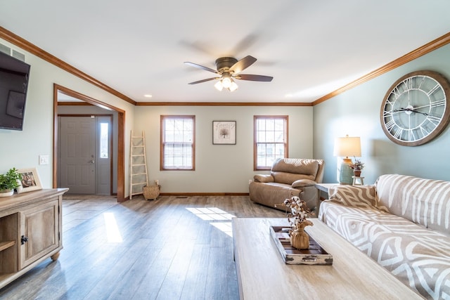 10909 Bittersweet Dells Ln, Fort Wayne, IN 46814 - living room with wood finished floors, a ceiling fan, crown molding, and baseboards