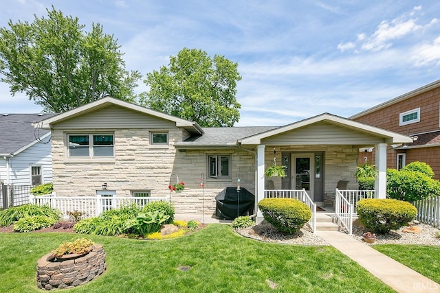 26051 Lake Dr, Elkhart, IN 46514 - view of front of property with stone siding and a porch