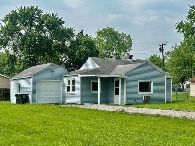 3912 E Fleming Ave, Fort Wayne, IN 46806 - view of front of property featuring a garage, roof with shingles, and an outdoor structure