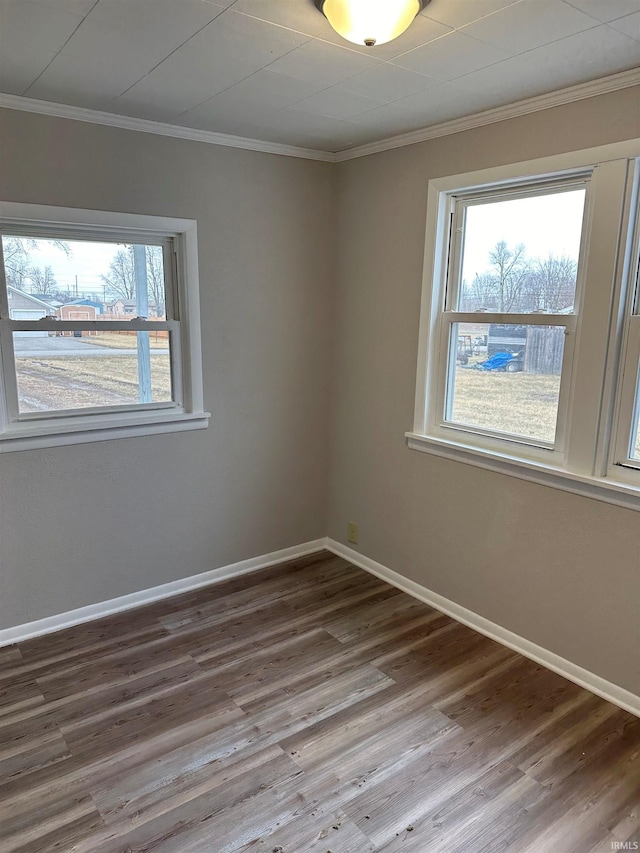 3912 E Fleming Ave, Fort Wayne, IN 46806 - unfurnished room with wood finished floors, baseboards, and ornamental molding
