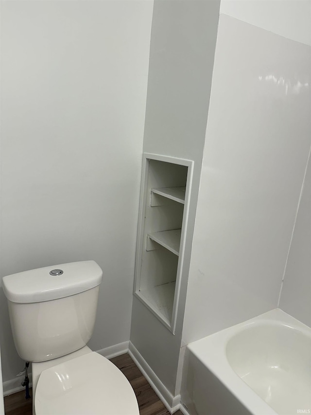 3912 E Fleming Ave, Fort Wayne, IN 46806 - bathroom with toilet, wood finished floors, and baseboards