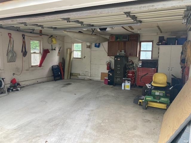 305 N Lincoln Ave, Fowler, IN 47944 - garage featuring a garage door opener
