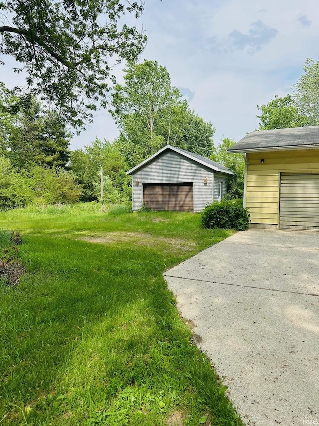3780 Thorn Rd, Walkerton, IN 46574 - view of yard featuring an outbuilding and a detached garage