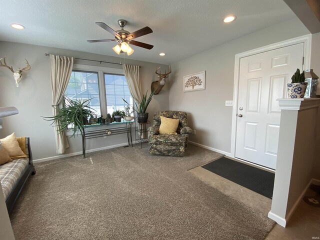 4310 E Duffy Dr, Syracuse, IN 46567 - sitting room featuring carpet flooring, a ceiling fan, baseboards, recessed lighting, and a textured ceiling