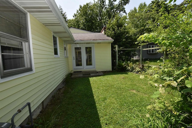 1200 S Longwood Dr, Bloomington, IN 47401 - view of grassy yard with french doors