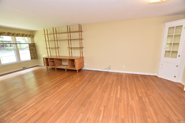 1200 S Longwood Dr, Bloomington, IN 47401 - empty room with light wood finished floors and baseboards
