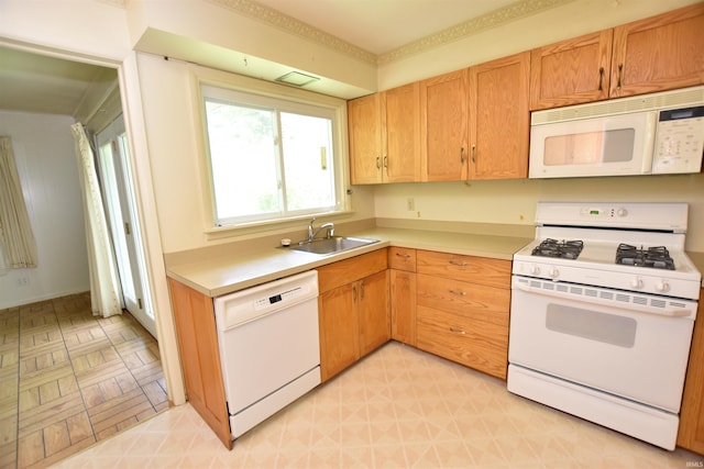 1200 S Longwood Dr, Bloomington, IN 47401 - kitchen with white appliances, a sink, light countertops, and light flooring