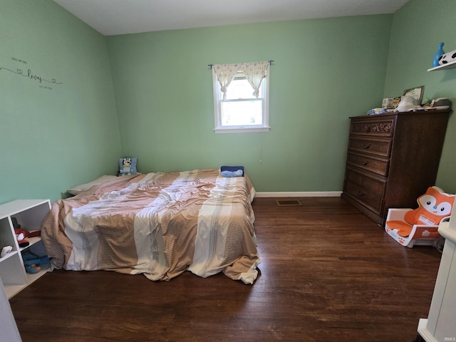 220 W Main St, Greentown, IN 46936 - bedroom with wood finished floors and baseboards