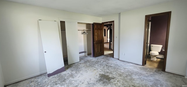 5002 Canterbury Dr, Fort Wayne, IN 46835 - unfurnished bedroom with a closet, baseboard heating, and connected bathroom