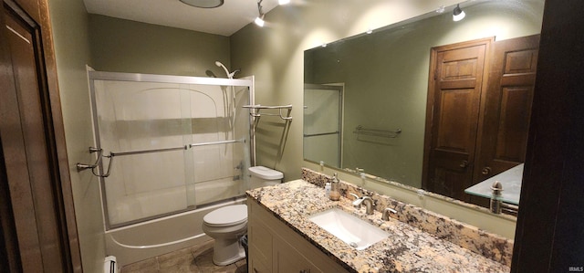 5002 Canterbury Dr, Fort Wayne, IN 46835 - full bathroom with toilet, vanity, and enclosed tub / shower combo